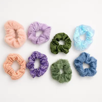 Hair scrunchies in assorted fabrics and colors