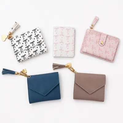 Bow print and tassel wallets in assorted styles